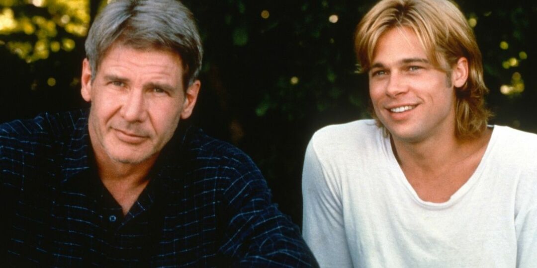 Harrison Ford sedi poleg nasmejanega Brada Pitta v filmu The Devil's Own.