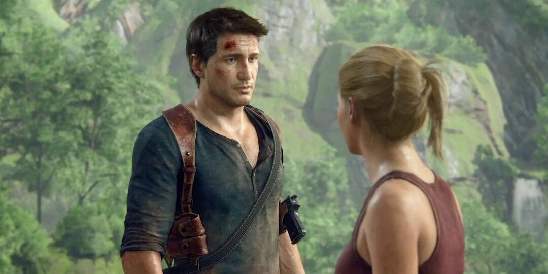 Nate olha tristemente para Elena em Uncharted 4 