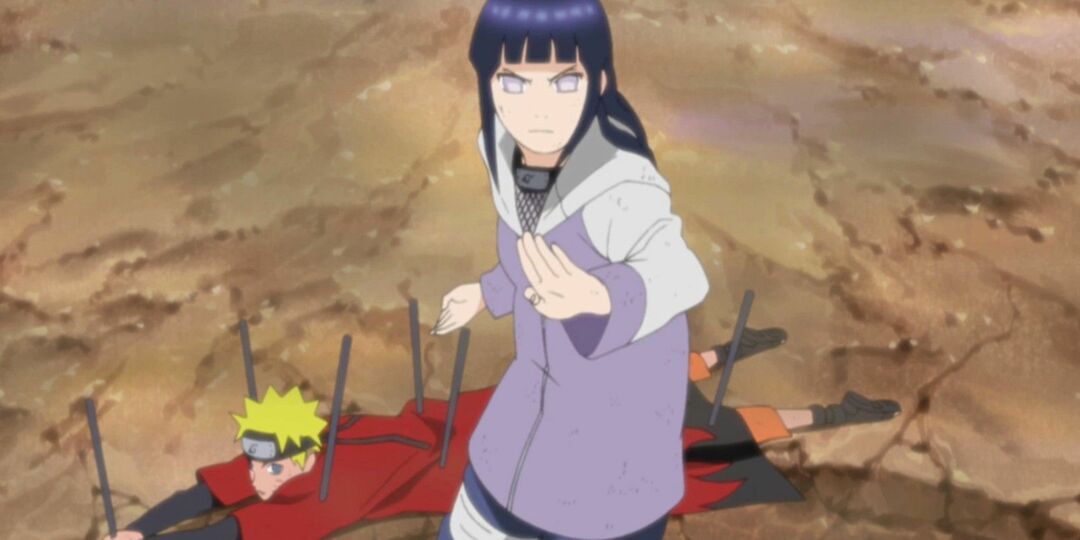 Hinata beschermt Naruto nadat hij is vastgepind door Pain in Naruto: Shippuden