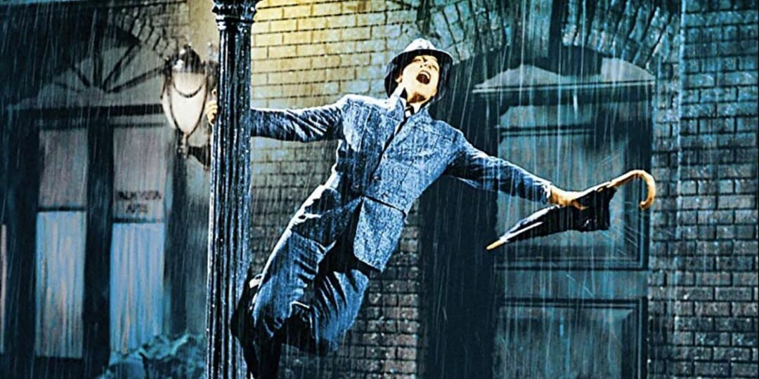 Gene Kelly in Cantando sotto la pioggia.