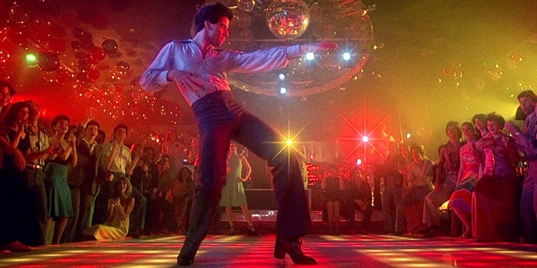 Travolta danser från Saturday Night Fever 