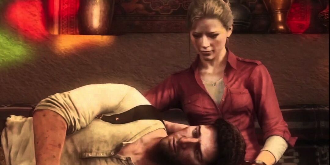 Nate descansa a cabeça no colo de Elena em Uncharted 3 